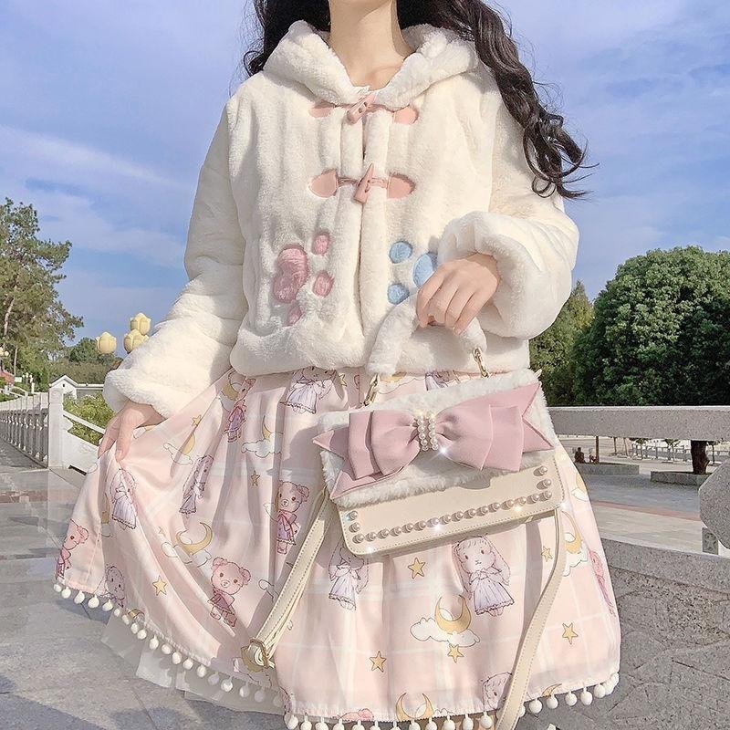 Manteau de fourrure de petite patte